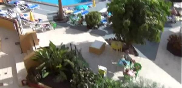  Christie gets oiled up and fucks herself on vacation balcony